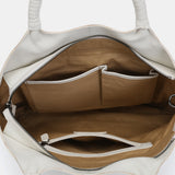 Shopper-Tasche mit Details aus weißem Leder.