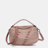 Crossbody bag with stitched details in pink leather