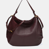 Shoulder bag in burgundy leather and suede