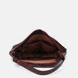 Shoulder bag in burgundy leather and suede