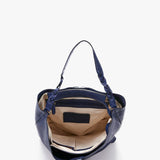 Damentasche im Hobo-Stil mit geflochtenem Griff aus blauer Leder.