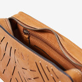 Women's mini crossbody bag in cognac perforated leather