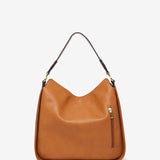 Umhängetasche aus recycelten Materialien in Cognac.