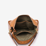 Umhängetasche aus recycelten Materialien in Cognac.