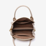 Bolso de mano en materiales reciclados beige
