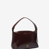 Shoulder bag in burgundy patent leather