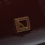 Shoulder bag in burgundy patent leather