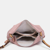 Organizer aus recyceltem rosa Material.