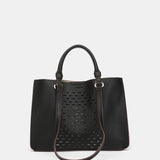 Die-cut handbag in black recycled materials