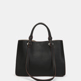 Die-cut handbag in black recycled materials