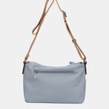 Umhängetasche aus recyceltem blauen Material.