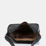 Shoulder bag in black recycled materials