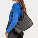 Shoulder bag in black recycled materials