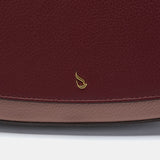 Shoulder bag in burgundy recycled materials
