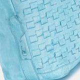 Damentasche aus geflochtenem Leder in Türkis.