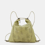 Bolso-mochila de mujer en piel troquelada verde