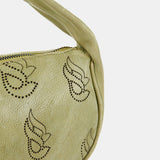 Women's handbag in green die-cut leather