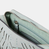 Bandolera mini de mujer en piel troquelada verde