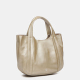 Gold leather handbag