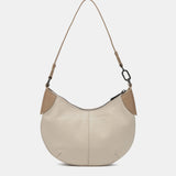 Kleine Schultertasche aus beige Leder.