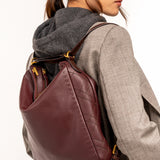 Bolso multifucional en piel burdeos