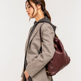 Bolso multifucional en piel burdeos