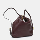 Bolso multifucional en piel burdeos