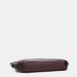 Bolso multifucional en piel burdeos