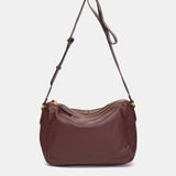 Shoulder bag in burgundy leather