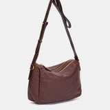 Shoulder bag in burgundy leather