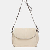 Beige leather and suede crossbody bag