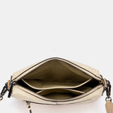 Umhängetasche aus beigem Leder