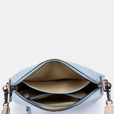 Bandolera en piel azul claro