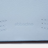 Bandolera en piel azul claro