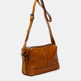 Bandolera pequeña en piel cognac