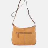 Bandolera en piel y serraje cognac