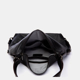 Bolso multifuncional en piel negra