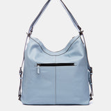 Bolso multifuncional en piel azul claro