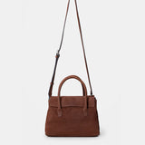 Brown leather handbag.