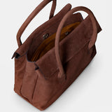 Brown leather handbag.
