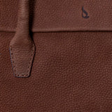 Brown leather handbag.