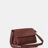 Brown leather crossbody bag.