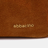 Cognac suede crossbody bag.