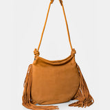 Cognac leather shoulder bag with fringe detailing.