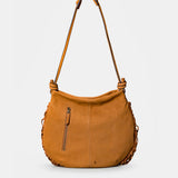 Cognac leather shoulder bag with fringe detailing.