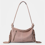 Beige leather shoulder bag with fringe detailing.
