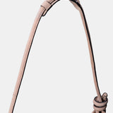 Beige leather shoulder bag with fringe detailing.