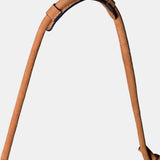 Shoulder bag in cognac leather with fringe details.