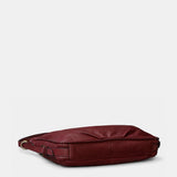 Bolso multifuncional en piel burdeos