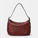 Bolso de mano en piel burdeos